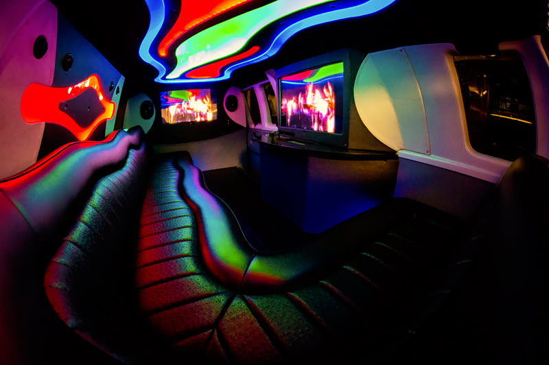 Party bus interior with dance pole