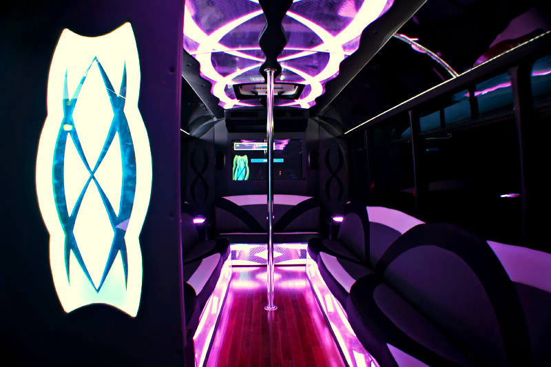 Party bus interior with removable dance pole